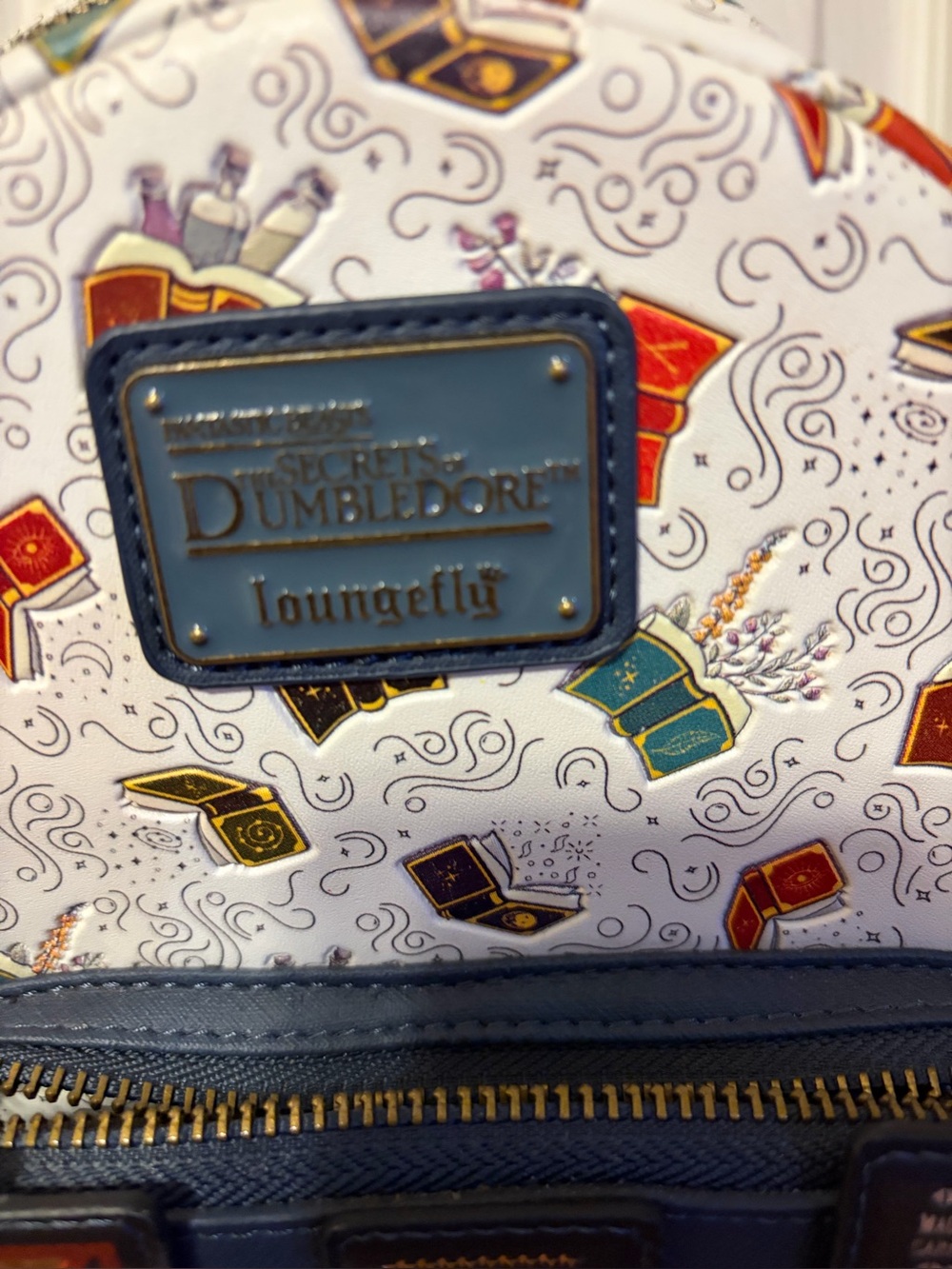 Loungefly White and Navy Secrets of Dumbledore Mini Backpack